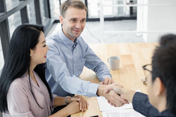 Business broker helping couple sell business